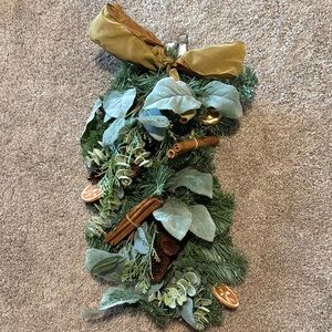 Festive Green Holiday Swag with Gold Bow